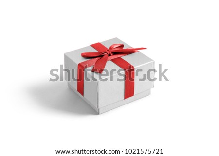 White gift box with red ribbon isolated on white background. Christmas and New Year's day Mock up template ready for your design.