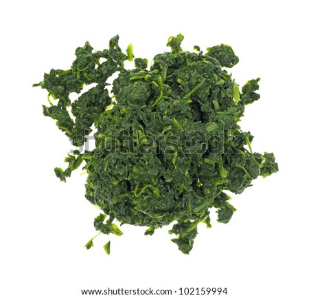 A large amount of freshly cooked chopped spinach on a white background. Royalty-Free Stock Photo #102159994
