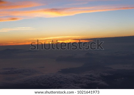 Scenery on the airplane, landscape above the sky, lower bounds, clouds, over the sky