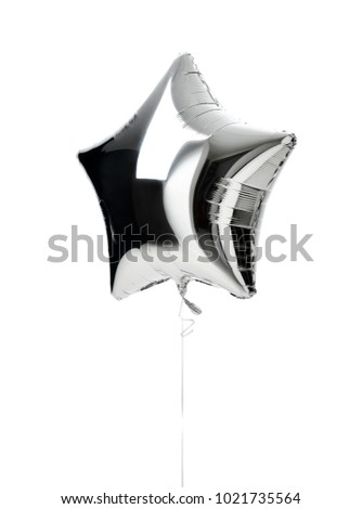 Single big silver star balloon object for birthday  party isolated on a white background