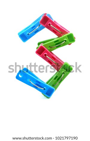 Alphabet number of three 3 font made from multi color plastic clothespin and one of zero to nine character symbol isolated on white clear background. - housekeeper with Dry cleaning style.