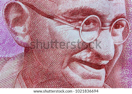 Gandhi portrait on 2000 Indian rupees note Royalty-Free Stock Photo #1021836694