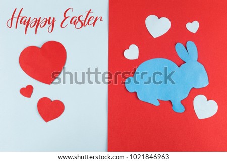 Inscription: Happy Easter and Easter Bunny with paper Heart cut outs