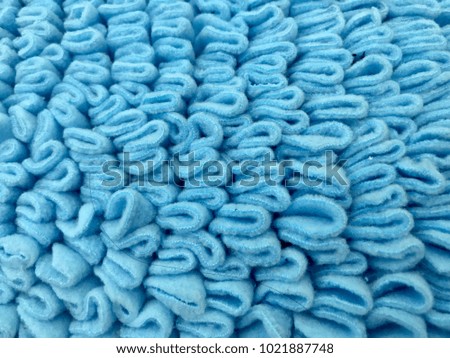 Blue carpet texture background, woven textile carpet for home use and decoration