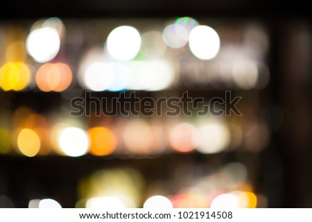 Light leaks bokeh abstract yellow  background of round shiny shapes with shallow depth of field
