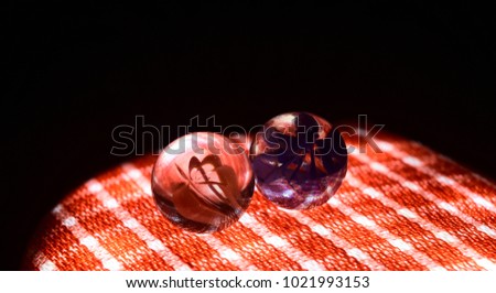 Marble balls isolated round shape objects with cotton made cloths background photograph