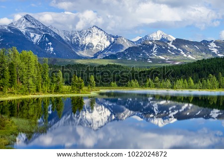 Wild mountain lake in the Altai mountains, summer landscape, beautiful reflection Royalty-Free Stock Photo #1022024872