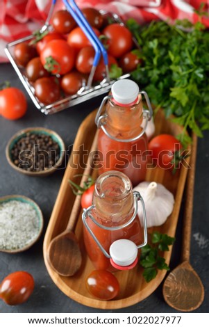 Tomato ketchup on a brown background