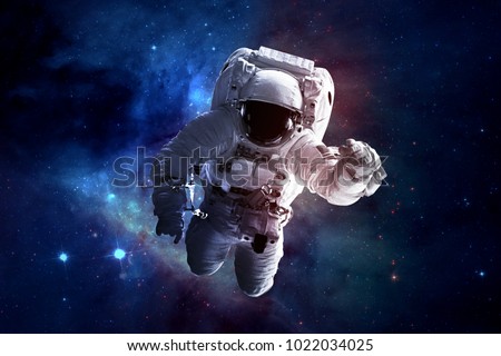 Astronaut - Elements of this Image Furnished by NASA Royalty-Free Stock Photo #1022034025
