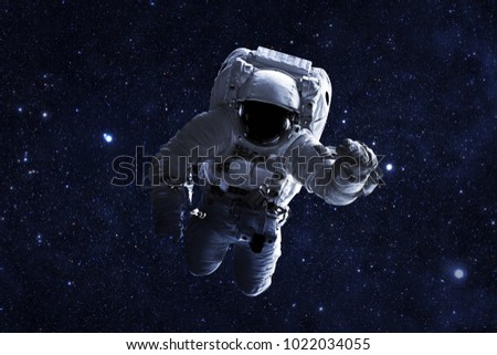 Astronaut - Elements of this Image Furnished by NASA Royalty-Free Stock Photo #1022034055