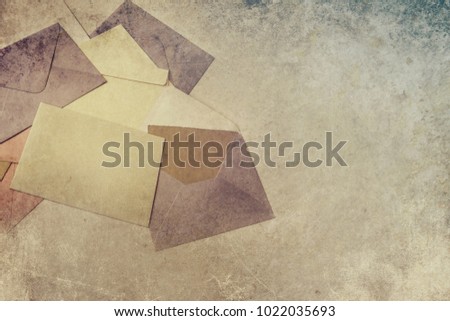 Envelopes, paper and vintage blank cards. Old paper textured background with copy space