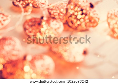 Blurred background template with soft rose gold heart lightings. Valentine's day, home decor ideas, 