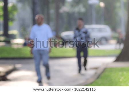 Blur focus out of focus. Royalty high quality free stock image of people do exercise morning in a park. The people who exercise in the park are very crowded