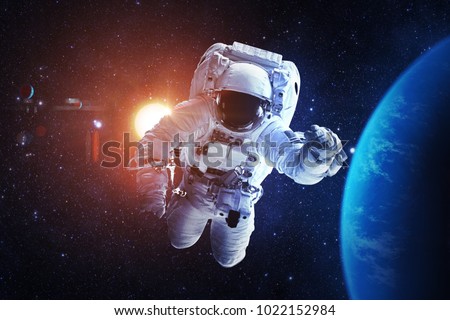 Astronaut - Elements of this Image Furnished by NASA Royalty-Free Stock Photo #1022152984