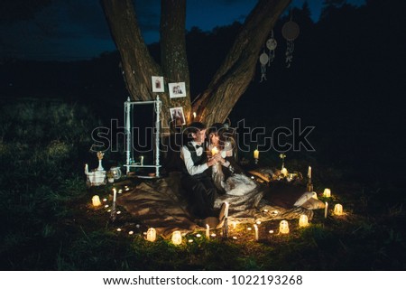 Amazing wedding couple near the river at night