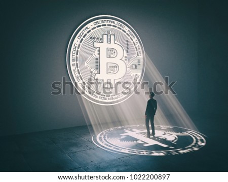 Businessman under bitcoin light. Cryptocurrency concept. Financial concept Virtual money Royalty-Free Stock Photo #1022200897