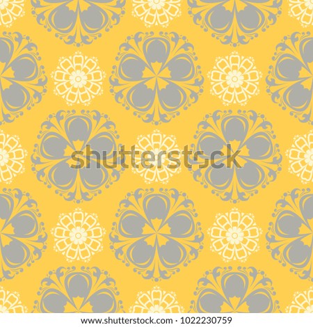 Seamless floral pattern. Bright yellow background with flower designs for wallpapers, textile and fabrics