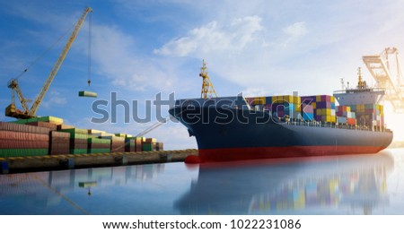 Cargo ship carrying container import and export  stand by in the cargo yard port concept freight shipping ship at container depot.
