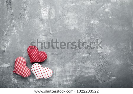 Love hearts on grey wooden table