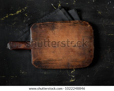 Empty cutting board Royalty-Free Stock Photo #1022248846