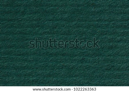 Dark green stripped paper texture background. High resolution photo.