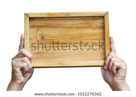 A man hand holding an empty wooden sign isolated on white background with clipping path.