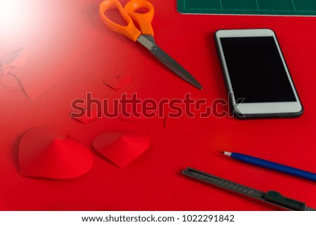 Red paper craft on red background, valentine concept