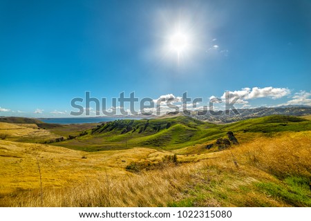 Sun shining over a lake in California, USA