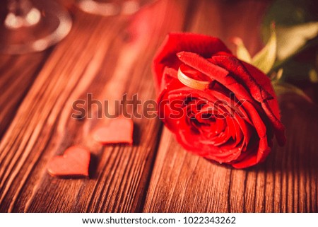 Valentine's day background with rose and ring