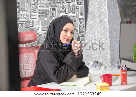 modern female Arabian office worker in office