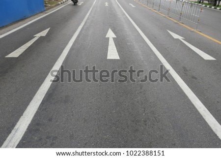 straight arrow on road