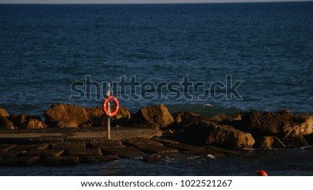 view of rocks in a blue sea