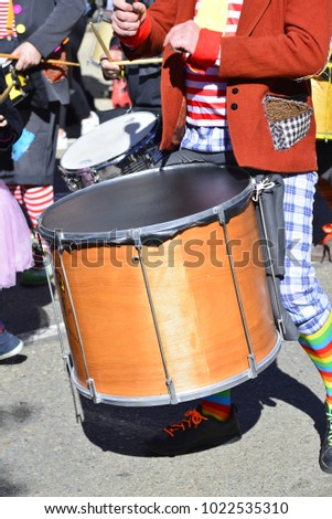 clown playing the drum