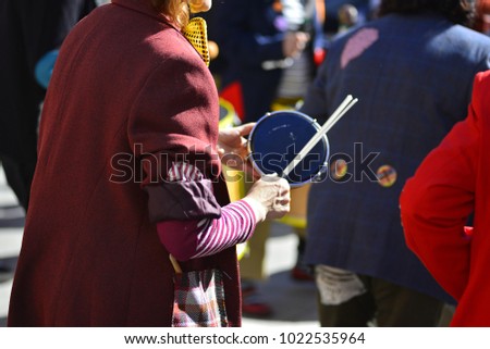 clown playing the drum