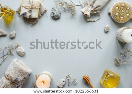 Spa composition. Various products for spa treatments on rustic wooden background. Copy space