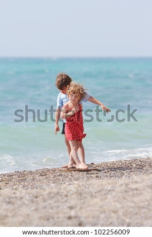 two children on sea background
