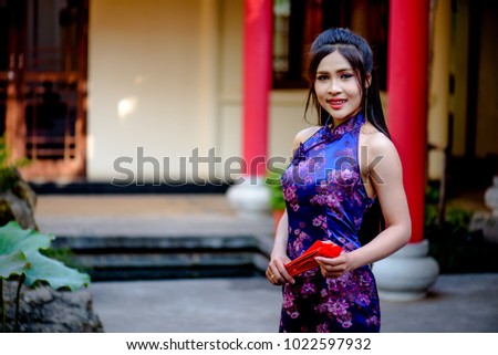 Beautiful girl in Qipao,Chinese New Year.
