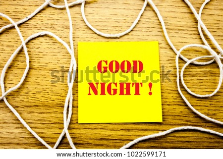 Good Night. word on yellow sticky note in wooden background. Bussines concept. Motivational.