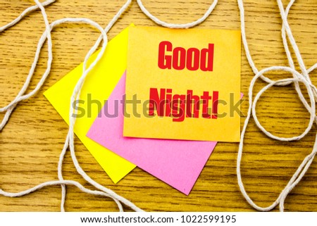 Good Night. word on yellow sticky note in wooden background. Bussines concept. Motivational.