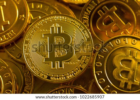 new crypto currency concept.Bitcoins ,Gold Coins ,Cryptocurrency with space for your Concept .