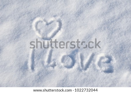Valentines Day background with heart on a snowy background. I love you. Romantic background