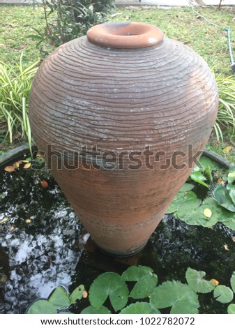 Water bowl in lotus pond is beautifully decorated.