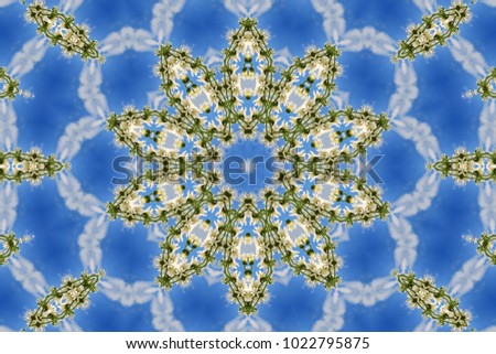 abstract background of floral pattern of a kaleidoscope. white blue green background fractal mandala. abstract kaleidoscopic arabesque. geometrical ornament flower pattern