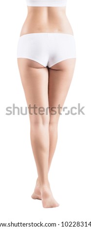 Female legs in white panties with a little overweight.