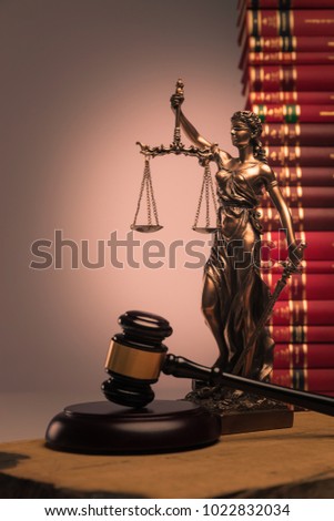 gavel, law books and justice statue shot in studio