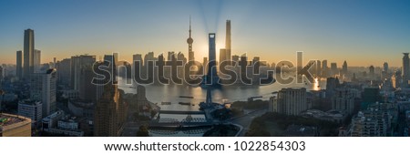 Shanghai Skyline and Huangpu River at Sunrise. Lujiazui District. Panoramic Aerial View.