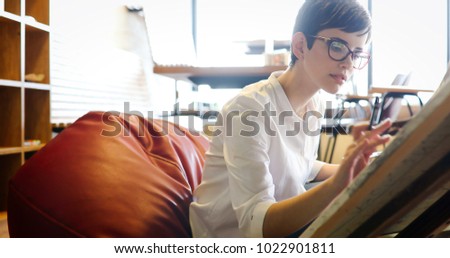 Creative female artist painting new picture