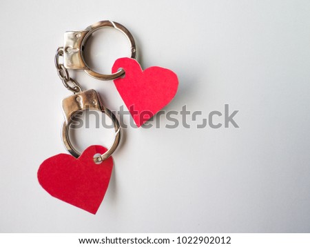 two red hearts bind with shackle, lock with love.