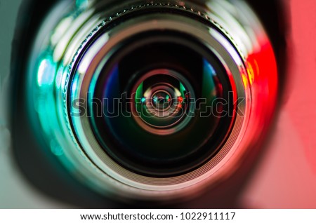 The camera lens and beautiful lighting red-green. Optics