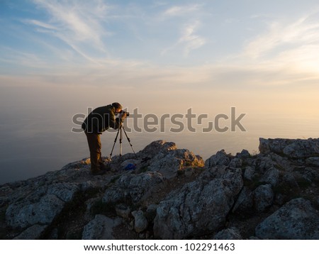 Photographer take a picture on a nature